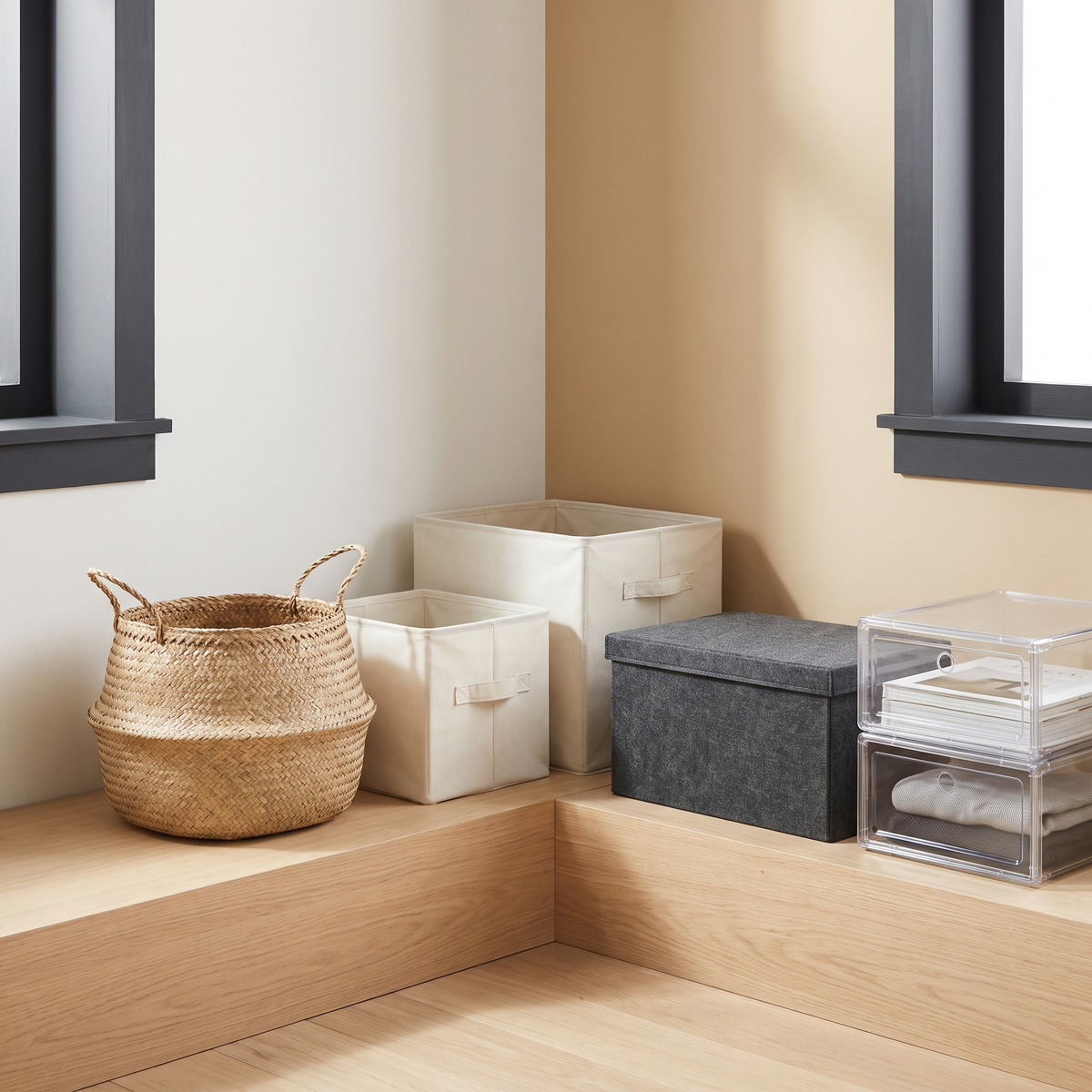 Seagrass basket, fabric storage bins, a felt box and a clear-front storage box